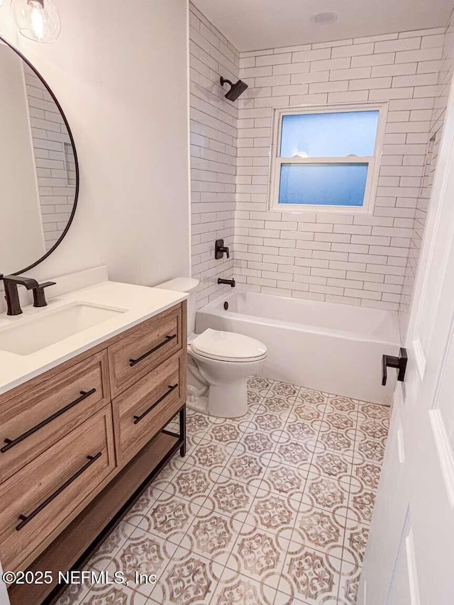 full bath with bathtub / shower combination, tile patterned floors, toilet, and vanity