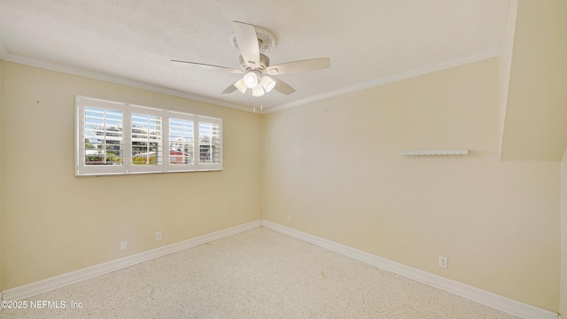 unfurnished room with ceiling fan, baseboards, and crown molding