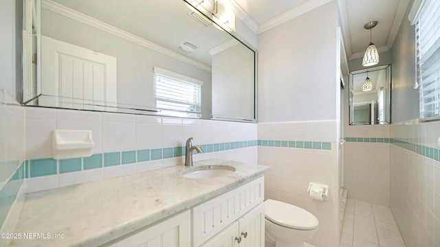 bathroom with ornamental molding, visible vents, tile walls, and toilet