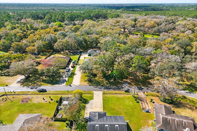 aerial view featuring a forest view