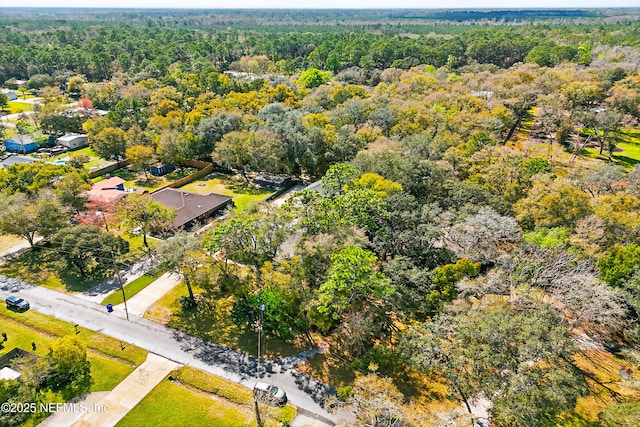 aerial view featuring a forest view