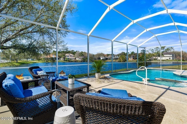 outdoor pool with glass enclosure, a water view, a patio, and an outdoor living space