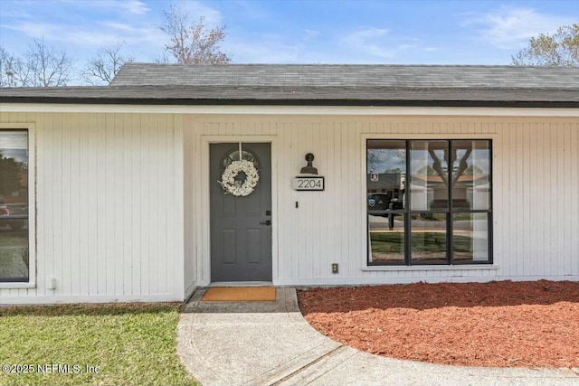 2204 Chablis Ct W, Orange Park, FL 32073 - view of exterior entry featuring a shingled roof