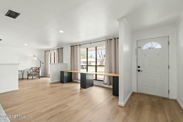 2204 Chablis Ct W, Orange Park, FL 32073 - entrance foyer with light wood finished floors, visible vents, and baseboards
