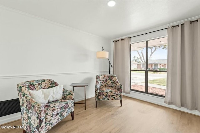 2204 Chablis Ct W, Orange Park, FL 32073 - sitting room featuring baseboards, ornamental molding, and wood finished floors