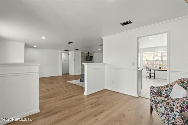 2204 Chablis Ct W, Orange Park, FL 32073 - empty room with light wood-type flooring, visible vents, crown molding, and recessed lighting