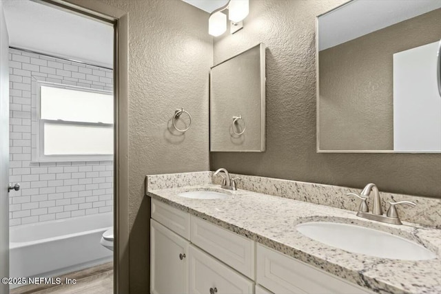2204 Chablis Ct W, Orange Park, FL 32073 - full bath with a textured wall and a sink