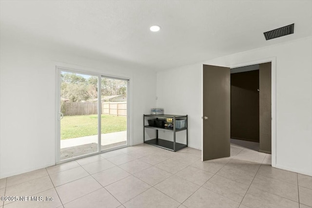 2204 Chablis Ct W, Orange Park, FL 32073 - empty room with light tile patterned floors, visible vents, and recessed lighting