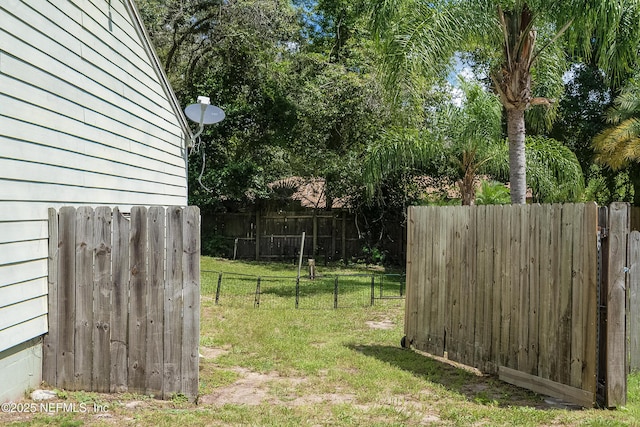 view of yard featuring fence