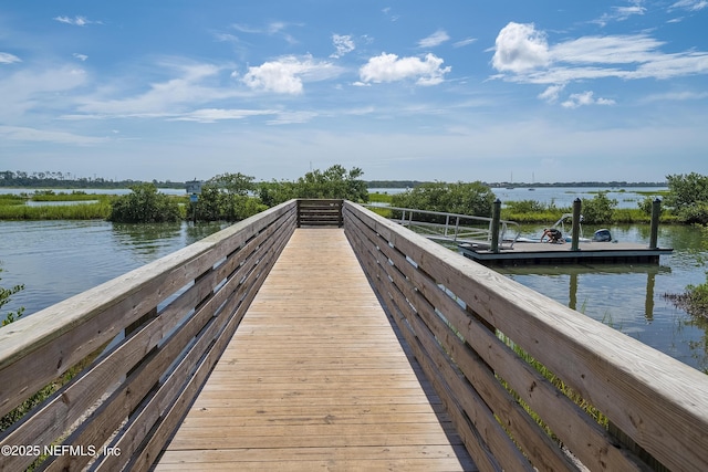 dock area featuring a water view