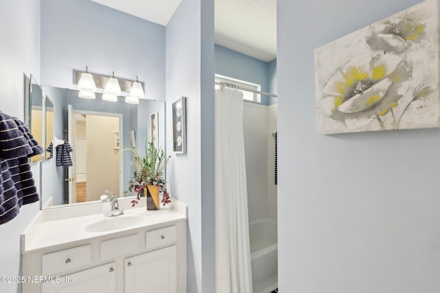 full bathroom with shower / bath combination with curtain and vanity