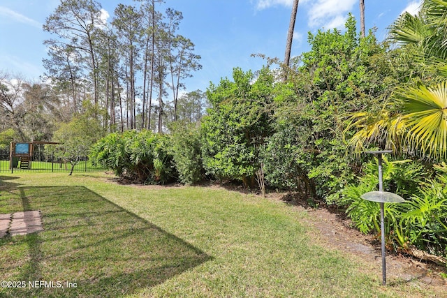 view of yard featuring fence