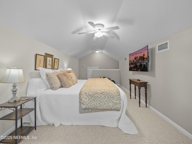 bedroom featuring visible vents, ceiling fan, baseboards, carpet, and lofted ceiling