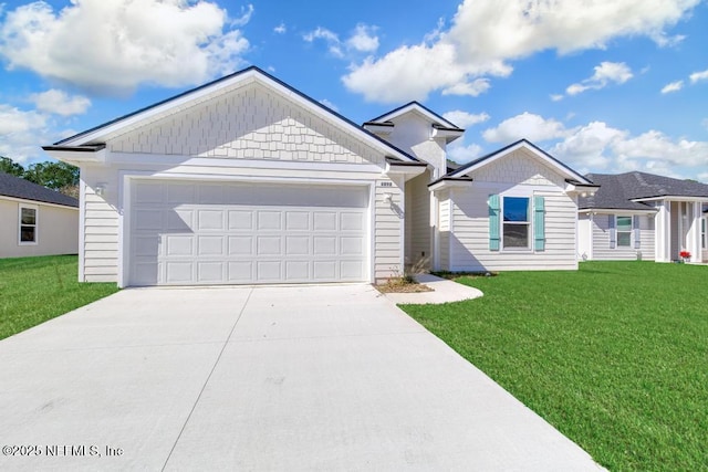 ranch-style home with driveway, a garage, and a front yard