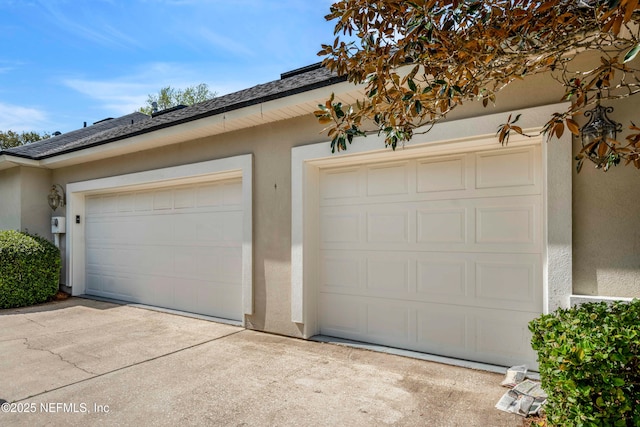 garage with driveway