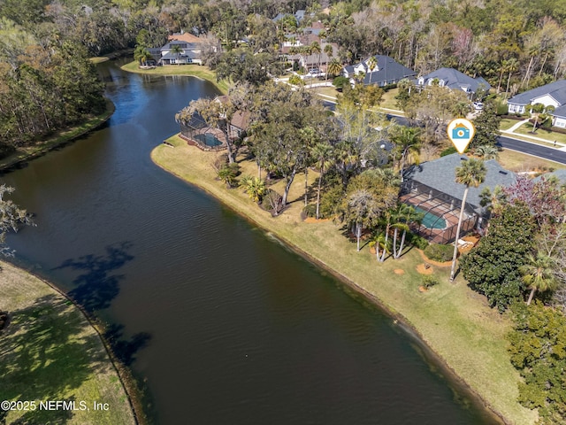 birds eye view of property featuring a residential view and a water view