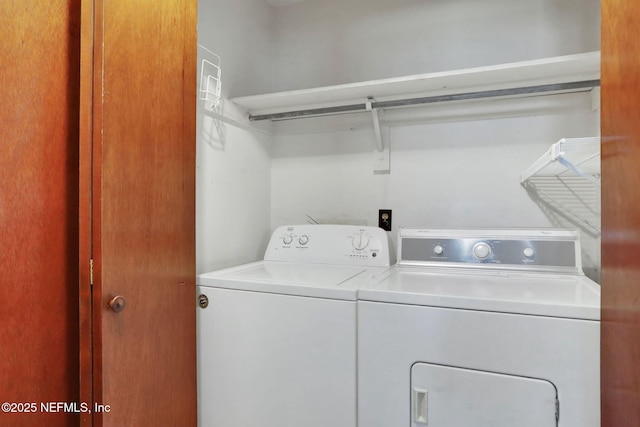 laundry area featuring laundry area and washing machine and clothes dryer