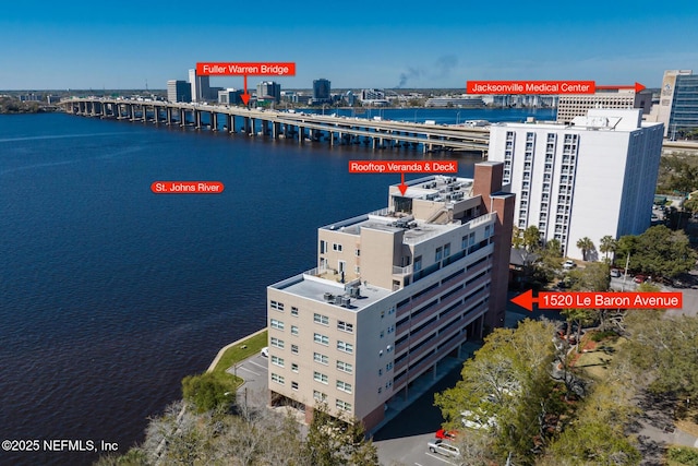 aerial view featuring a view of city and a water view