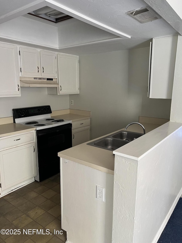 kitchen with visible vents, white cabinets, electric stove, under cabinet range hood, and a sink