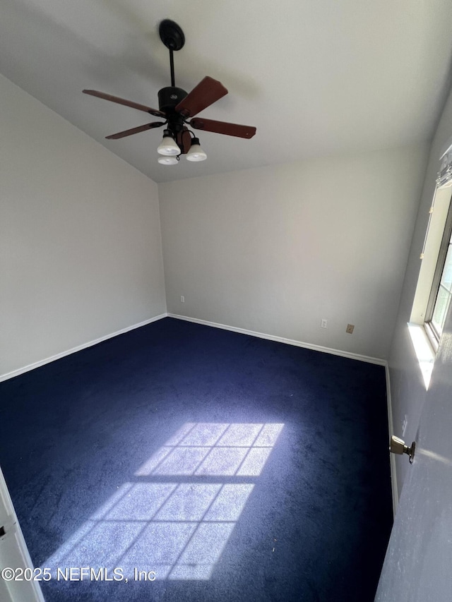 empty room featuring ceiling fan, carpet flooring, and baseboards