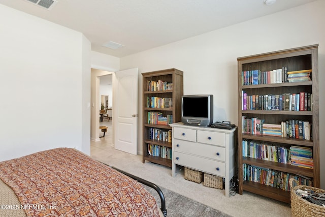 bedroom with carpet floors and visible vents