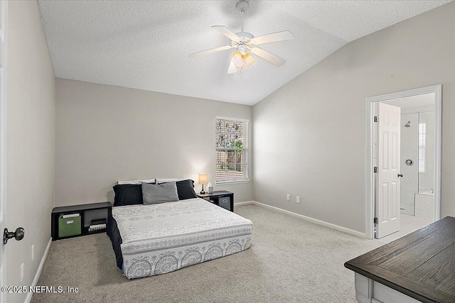 bedroom featuring carpet, vaulted ceiling, a textured ceiling, ceiling fan, and baseboards