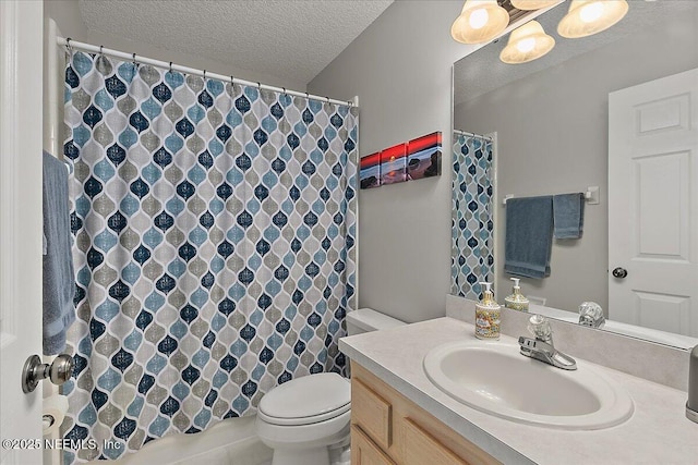 bathroom with a textured ceiling, vanity, toilet, and a shower with curtain