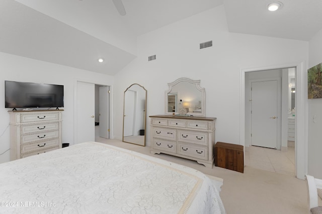 bedroom with carpet floors, high vaulted ceiling, ceiling fan, and visible vents