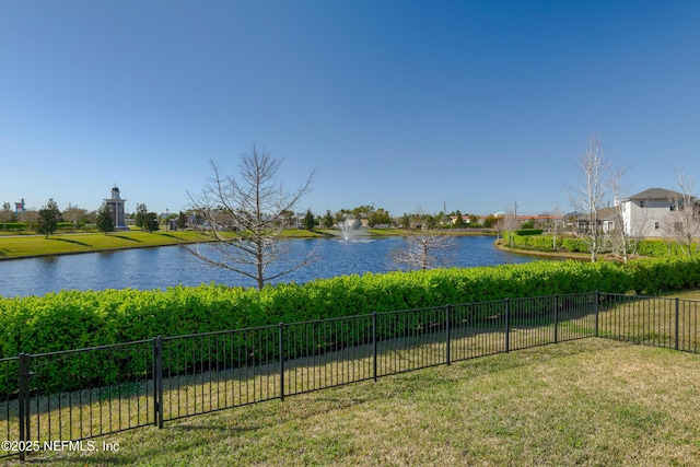 view of water feature with fence