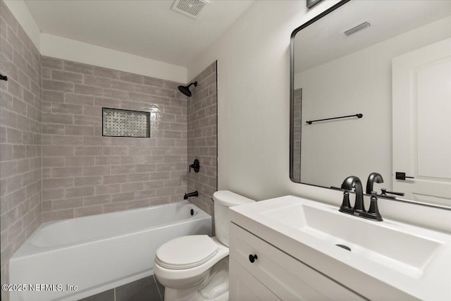 full bathroom with visible vents, shower / bathing tub combination, vanity, and toilet