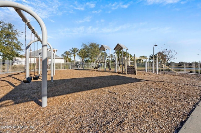 community playground featuring fence