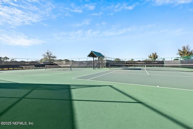 view of sport court featuring community basketball court and fence