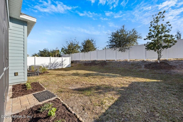 view of yard with a fenced backyard