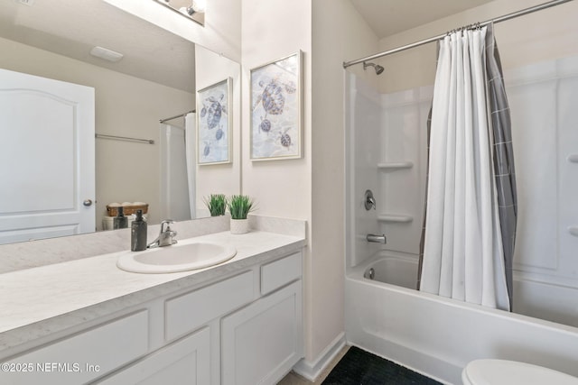 bathroom with toilet, vanity, and shower / bathtub combination with curtain