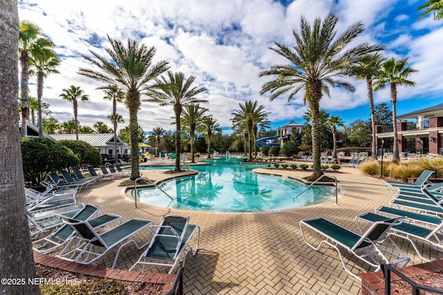 pool with a patio area