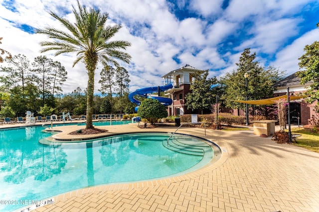 community pool with a water slide