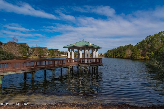 view of dock featuring a water view and a gazebo