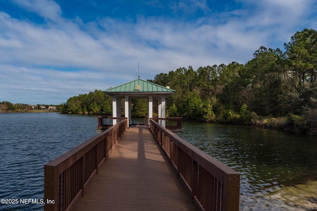 dock area featuring a gazebo and a water view