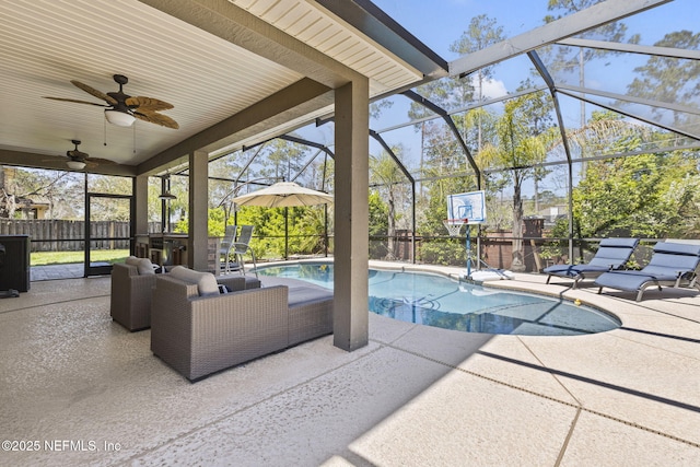 view of pool featuring a fenced in pool, a patio, a lanai, and a ceiling fan