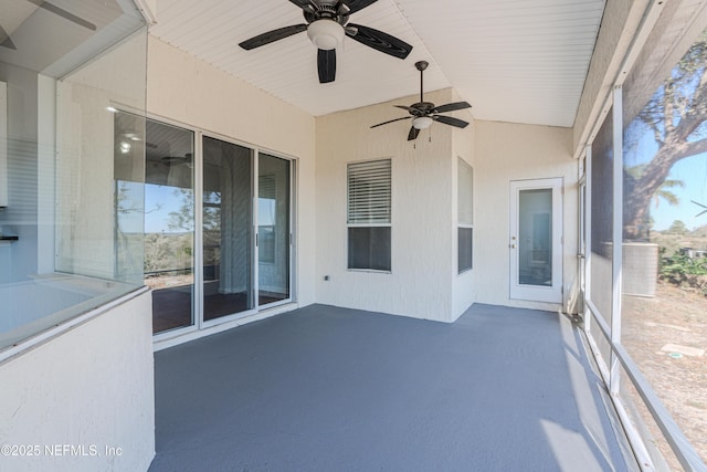 unfurnished sunroom with vaulted ceiling