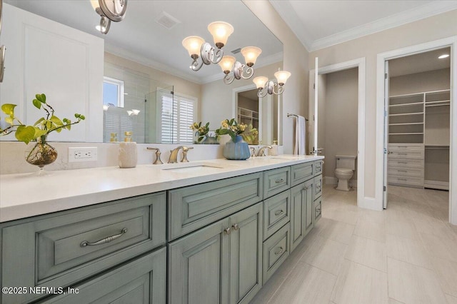 bathroom featuring visible vents, a shower stall, crown molding, toilet, and double vanity