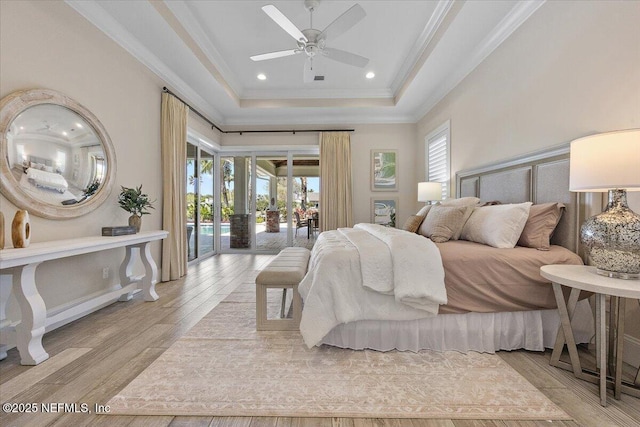 bedroom featuring access to outside, multiple windows, light wood-style flooring, and ornamental molding