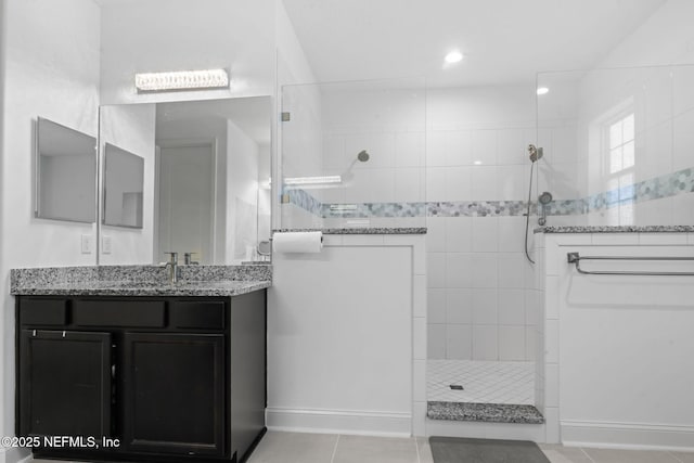 full bath with recessed lighting, walk in shower, vanity, and tile patterned floors