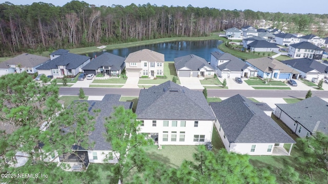 aerial view with a water view and a residential view