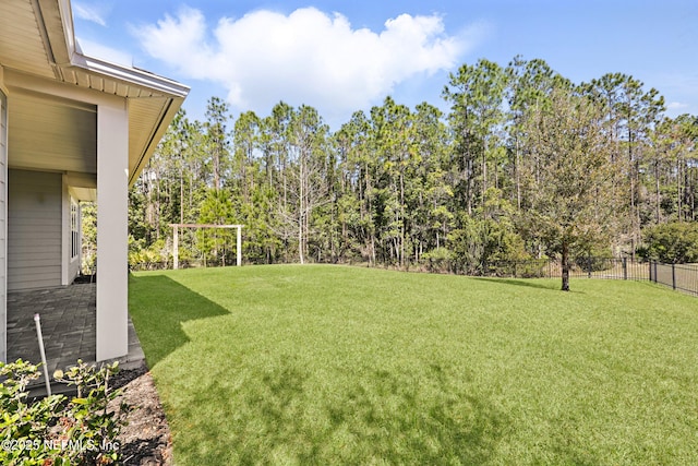 view of yard with fence