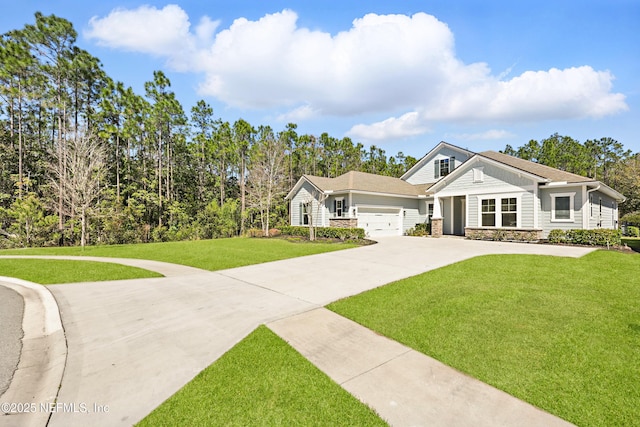 view of front of property with a front yard, a garage, stone siding, and driveway