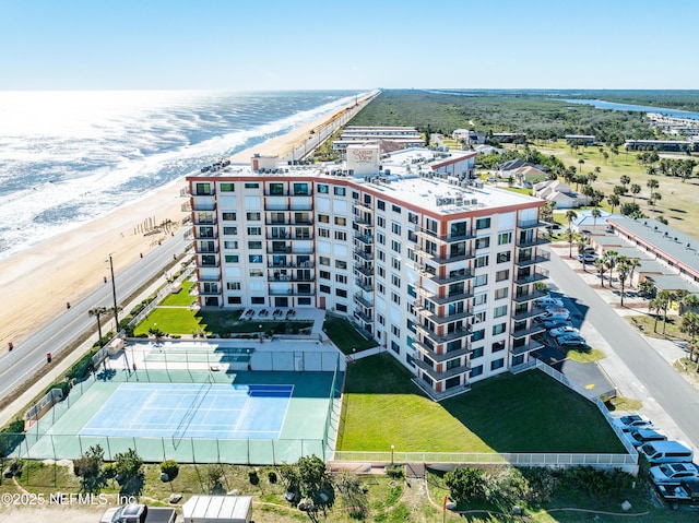 aerial view featuring a view of the beach and a water view