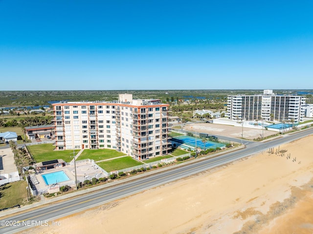 drone / aerial view featuring a city view