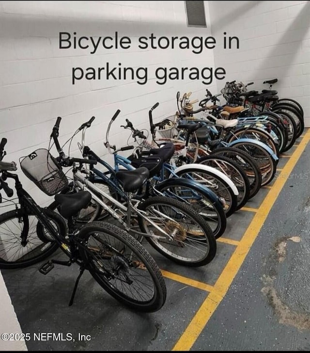 garage with concrete block wall