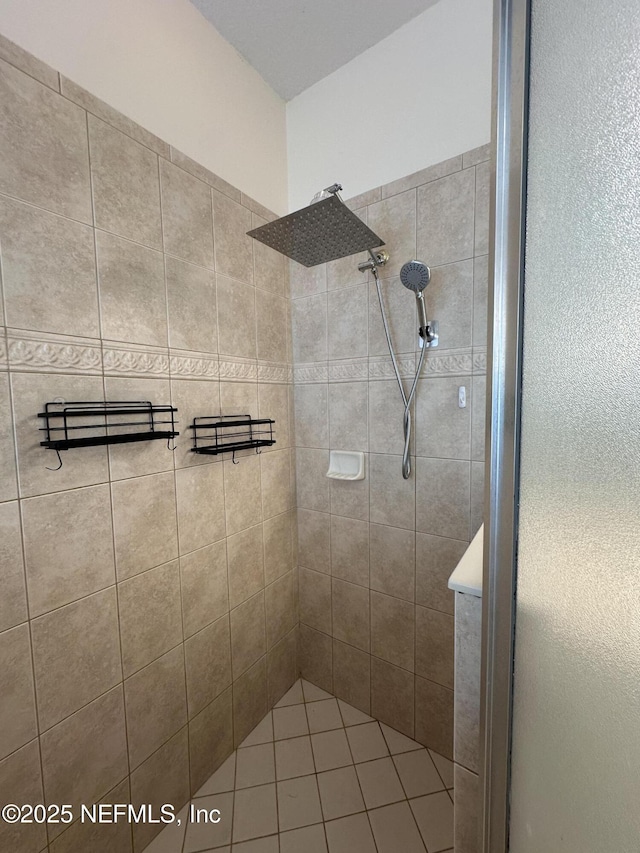 full bath featuring a shower stall